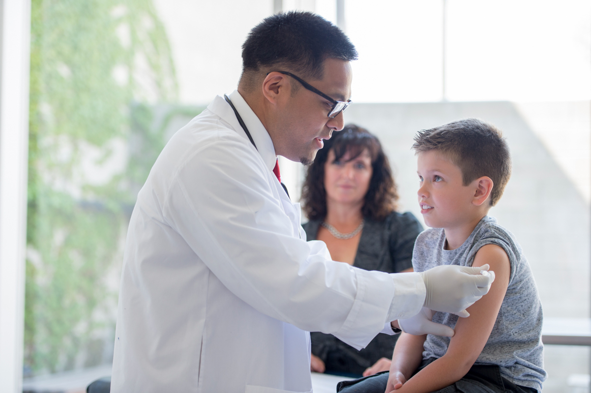 child-vaccinated-with-doctor child vaccinated with doctor